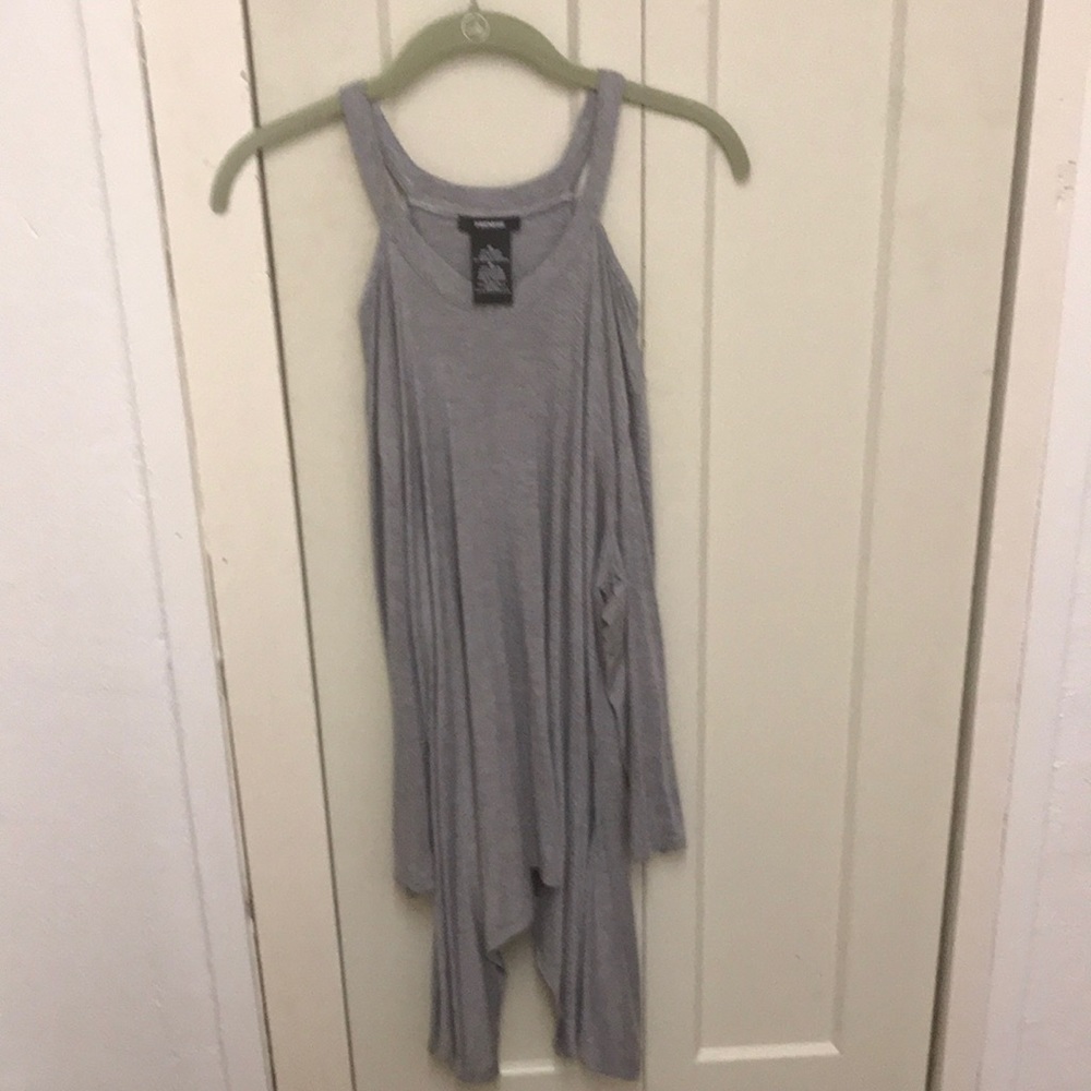 Long sleeve tunic. Handkerchief style.